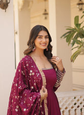 Freshly looking wedding wear gown in magenta colour